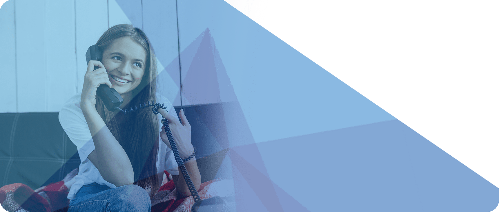 Woman talking on a landline phone